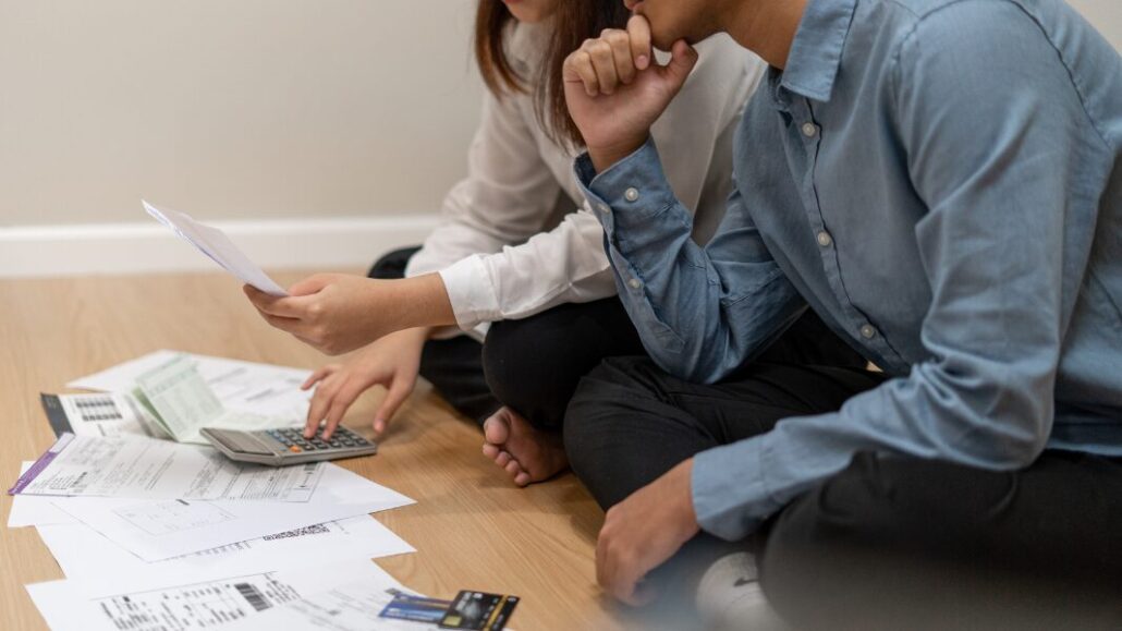 Two people reviewing finances