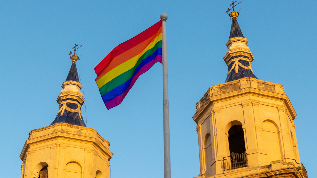 lgbtq flag and church
