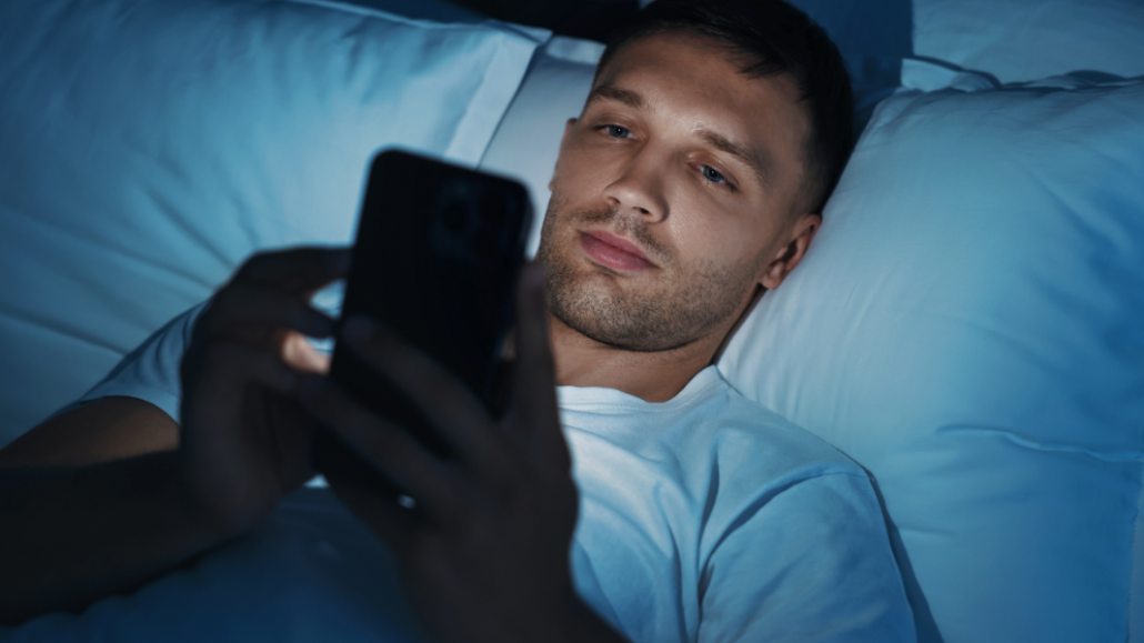 man repeating pattern of scrolling